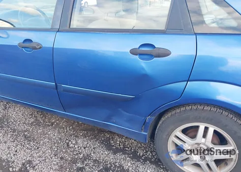 2002 Ford Focus Se z USA, uszkodzony, nr VIN 1FAHP34P62W296686